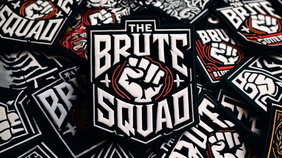 A pile of embroidered patches featuring 'THE BRUTE SQUAD' logo, which includes a clenched fist in the center. The patches are in various designs and color schemes, primarily in white, black, orange, and gray