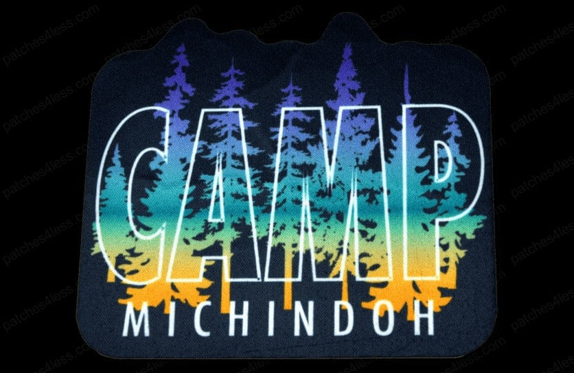 Printed patch with a gradient forest scene transitioning from yellow to blue, featuring the word CAMP in large letters and MICHINDOH below it.