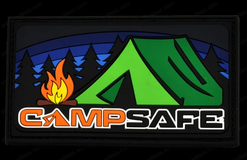 Rectangular PVC patch featuring a green tent and a campfire with trees and a night sky in the background. The text on the patch reads Camp Safe.