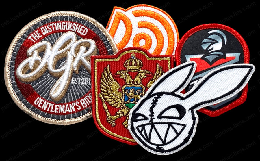 A collection of custom patches. Includes a circular patch with 'The Distinguished Gentleman's Ride', an orange spiral, a red shield with a golden emblem, a white bunny face with a stitched mouth, and a knight helmet with a red background.