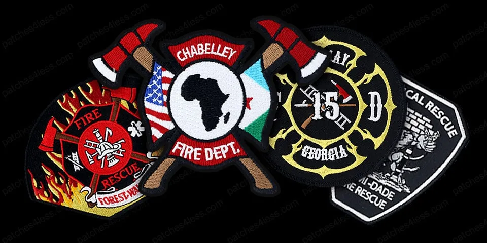 A collection of five fire department patches. Features include a red fire rescue emblem with flames, a shield with axes and the text 'Chabelley Fire Dept.', a circular patch with the text '15 AR Georgia', and a black and white patch with the text 'Miami-Dade Technical Rescue'.