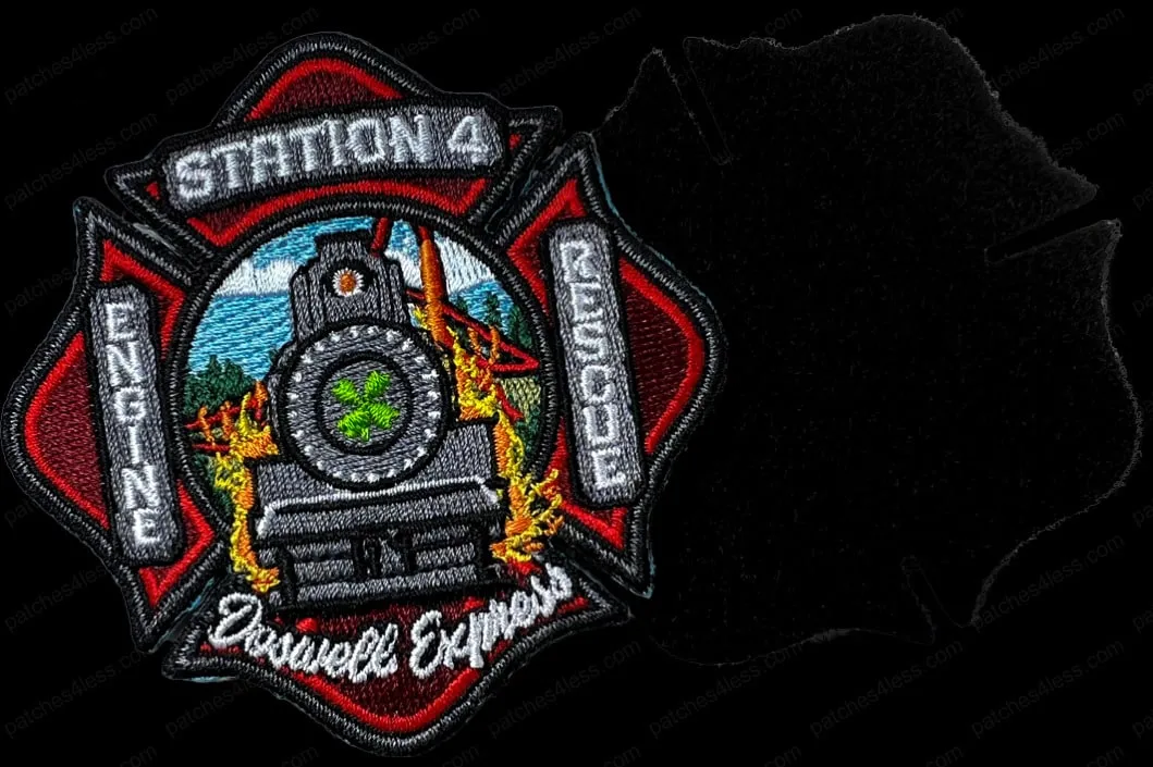 A fire department patch with a red and black Maltese cross design, featuring a train engine and the text 'Station 4 Engine Rescue Roswell Express'.