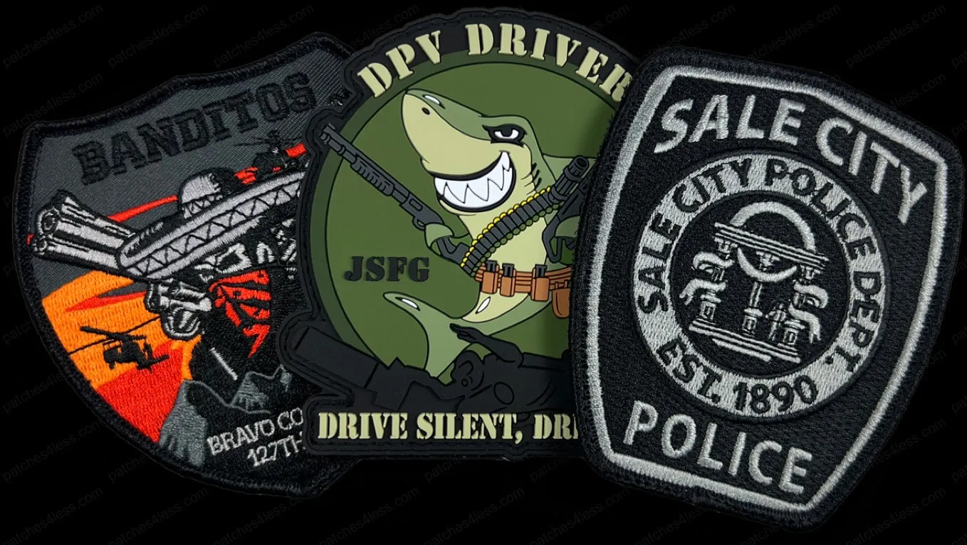 Three velcro patches. One features a soldier and the text 'Banditos Bravo Co 127th', another shows a shark with guns and the text 'DPV Driver JSFG Drive Silent, Drive Deep', and the third is a black and gray patch with 'Sale City Police Dept. Est. 1890 Police'.